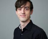 Portrait photo of Kieran Barvenik from the shoulders up.